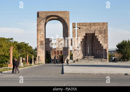 Main entrance to Holy See of Echmiadzin with carved stone monument (2001), Vagharshapat, Armavir province, Armenia Stock Photo