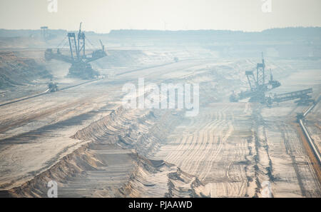 dpatop - 05 September 2018, Germany, Elsdorf: There are large excavators in the Hambach opencast lignite mine. In the background is the Hambach Forest. Photo: Christophe Gateau/dpa Stock Photo