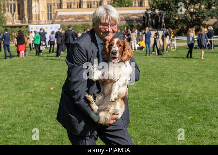 London, UK. 6th September 2018 Westminster Dog of the year event in Victoria Tower Gardens, London, UK. Andrew Mitchell MP with his dog Scarlet Credit Ian Davidson/Alamy Live News Stock Photo