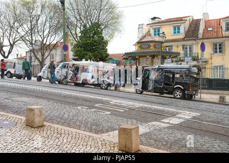 LISBON - MARCH 29 , 2018 : motorized taxi on the street in Lisbon, Portugal Stock Photo