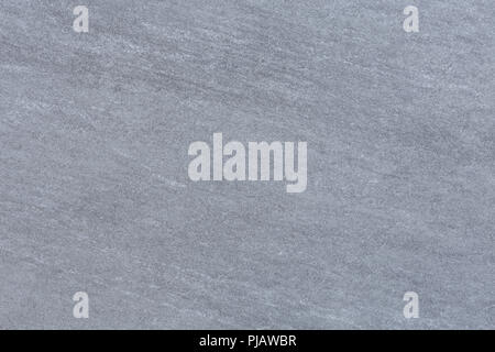 Closeup of a gray stone texture pattern on a porcelain floor tile Stock Photo