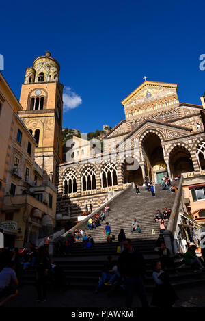 The Glittering Saint Andrew's Cathedral in Amalfi.. The cathedral dates back to the 11th century. The stairs were built in 1203 for Cardinal Pietro Stock Photo