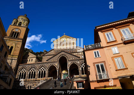 The Glittering Saint Andrew's Cathedral in Amalfi.. The cathedral dates back to the 11th century. The stairs were built in 1203 for Cardinal Pietro Stock Photo