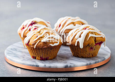 Muffins, cakes with cranberry and pecan nuts. Christmas decoration. Close up. Stock Photo