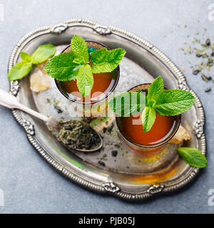 Mint tea, Moroccan traditional drink in glass. Top view. Stock Photo