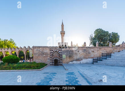 View of Rizvaniye Medresesi(Madrasah) and Balikli Gol(fish lake) in Sanliurfa city center.Sanliurfa,Turkey.18 July 2018 Stock Photo