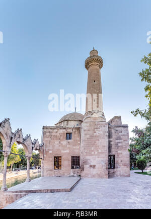 View of Rizvaniye mosque in Rizvaniye Madrasah near Balikli Gol(fish lake) in Sanliurfa city center.Sanliurfa,Turkey.18 July 2018 Stock Photo