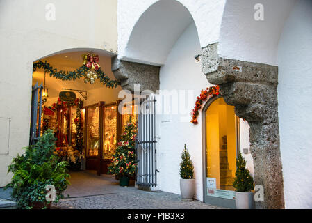Vaulted passage ways in historic Salzburg in Austria at Christmas are a delight to the visitor of this medieval city center. Stock Photo