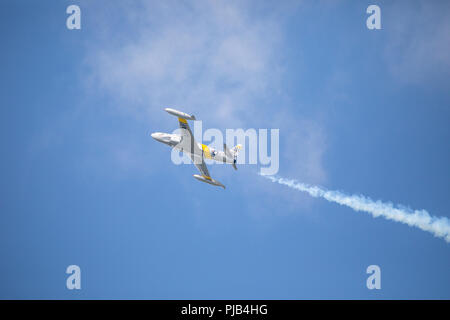 T-33 Jet flying into a blue sky Stock Photo