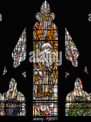 An angel ascending in a ball of flame, Turnbull Window, Christopher Whall (1905), St Oswald's Church, Ashbourne, Derbyshire, UK Stock Photo