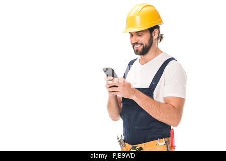 happy workman in hard hat using smartphone isolated on white Stock Photo