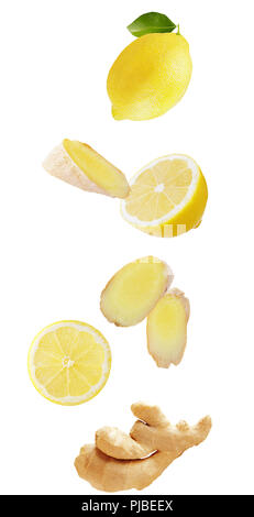 Flying fruits. Falling lemon and ginger isolated on white background with clipping path as package design element and advertising. Floating fruits in  Stock Photo