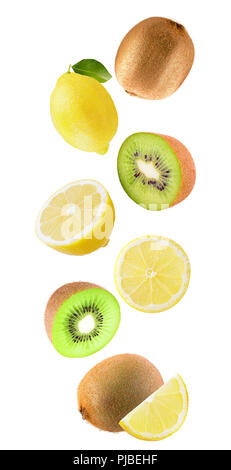 Flying fruits. Falling lemon and kiwi isolated on white background with clipping path as package design element and advertising. Floating fruits in th Stock Photo