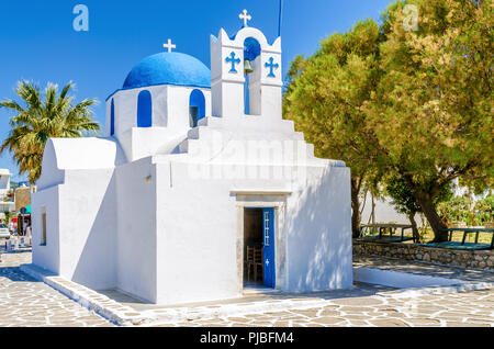 White Greek church with blue dome in Parikia. Paros island, Greece Stock Photo