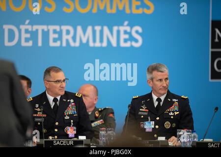 General Curtis M. Scaparrotti, Supreme Allied Commander Europe, and General John W.  Nicholson Jr., Resolute Support Mission commander, wait for the commencement of a North Atlantic Council session during the Brussels Summit at NATO HQ, Brussels, July 12, 2018. The Brussels Summit is the 28th NATO Summit in the history of the organization. (NATO Stock Photo