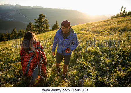 Couple enjoying hillside view, Chas de Egua, Portugal - Stock