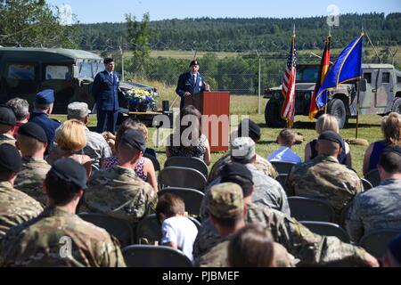 U.S. Air Force Col. J. Brad Reed, center, commander of 4th Air Support Operations   Group, delivers his remarks during the 2d Air Support Operations Squadron change of command ceremony at Rose Barracks, Vilseck, Germany, July 3, 2018. Lt. Col. Michael Hayek assumed command from Lt. Col. David Heinitz and became the first Air Liaison Officer to command the squadron. Stock Photo