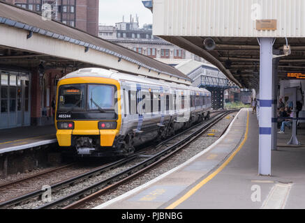 southeastern railway trains in a platform end to end. train carriages ...