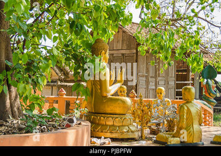 Chong Koh, Cambodia - April 9, 2018: Place of worship and a cult site of a small remote village Chong Koh on the bank of the Mekong River with its Bud Stock Photo