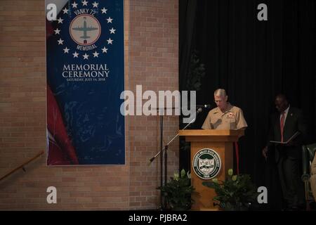 Lt. Gen. Rex C. McMillian, commander of Marine Forces Reserve and Marine Forces North, addresses the loved ones, community members and distinguished visitors who gather in the Mississippi Valley State University auditorium to honor the sacrifice of the fallen passengers and crew of Yanky 72, during the Memorial Ceremony, July 14, 2018. The Yanky 72 Memorial Ceremony was held to remember and honor the ultimate sacrifices made by the fallen Marines and Sailor of VMGR-452 and Marine Corps Special Operations Command. Stock Photo