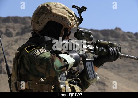 Female Tactical Platoon members fire during a qualification range near  Kabul, Afghanistan, Mar. 13, 2018. FTP