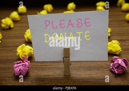 Handwriting text Please Donate. Concept meaning Supply Furnish Hand out  Contribute Grant Aid to Charity Display of Different Color Sticker Notes  Stock Photo - Alamy