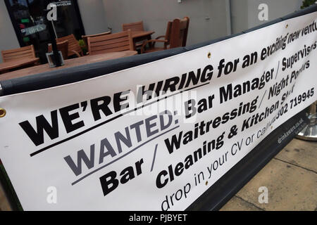 We're Hiring sign outside a wine bar in Bawtry, England Stock Photo