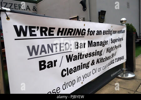 We're Hiring sign outside a wine bar in Bawtry, England Stock Photo