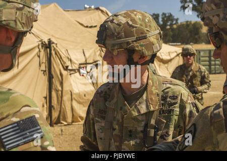 FORT HUNTER LIGGETT-- U.S. Army Reserve Maj. Gen. A. Ray Royalty visits various units during the 91st Training Division's Combat Support Training Exercise on Ft. Hunter Liggett, California, July 17, 2018. The CSTX 91-18-01 ensures America’s Army Reserve units are trained to deploy bringing capable, combat-ready, and lethal firepower in support of the Army and our joint partners anywhere in the world. Stock Photo