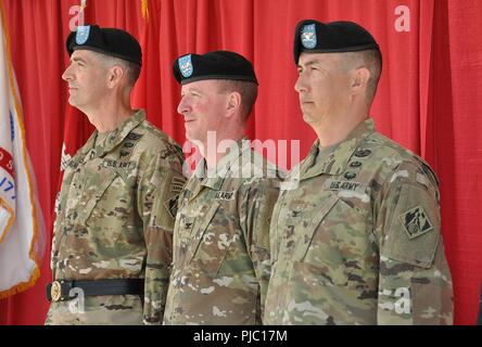 From left to right, Brig. Gen. Pete Helmlinger, U.S. Army Corps of Engineers South Pacific Division commander; Col. Kirk Gibbs, outgoing U.S. Army Corps of Engineers Los Angeles District commander; and Col. Aaron Barta, incoming U.S. Army Corps of Engineers Los Angeles District commander, stand at attention during a July 19 change of command ceremony at Fort MacArthur in San Pedro, California. Stock Photo