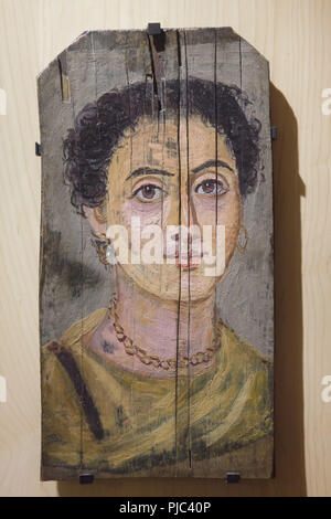 Female mummy portrait from the Fayum Oasis dated from the 2nd century AD on display in the Louvre Museum in Paris, France. Stock Photo