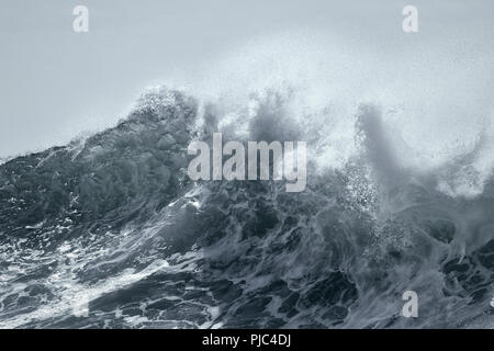 Top of a big stormy sea wave. Toned blue. Stock Photo