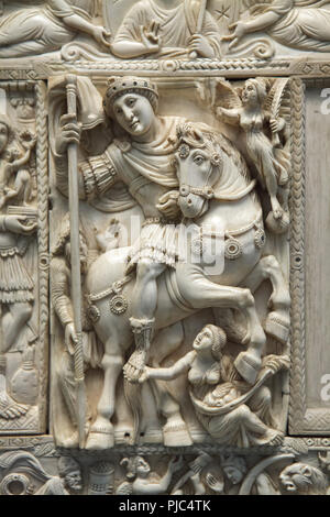 Triumphant Byzantine emperor depicted in the central panel of the Barberini ivory on display in the Louvre Museum in Paris, France. The Byzantine ivory leaf dated from the first half of the 6th century represents the emperor as triumphant victor, usually identified as Emperor Justinian, or possibly Anastasius I Dicorus or Zeno. Stock Photo