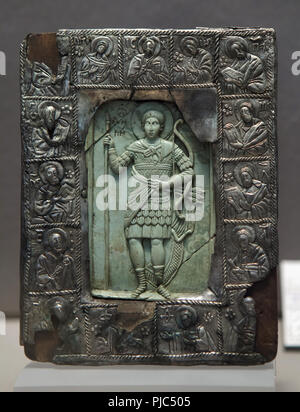 Byzantine icon of Saint Demetrios of Thessaloniki on display in the Louvre Museum in Paris, France. Byzantine icon dated from the beginning of the 14th century with the silver frame from Balkan dated from the 16th century. Stock Photo