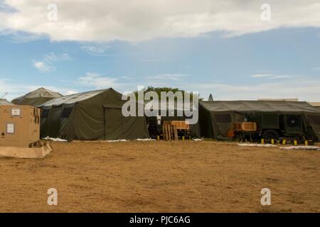 https://l450v.alamy.com/450v/pjc6ag/joint-base-pearl-harbor-hickam-hawaii-july-14-2018-the-tactical-operations-center-serves-as-the-command-and-control-center-for-the-humanitarian-assistance-disaster-exercise-hadr-phase-of-rimpac-at-joint-base-pearl-harbor-hickam-during-rim-of-the-pacific-rimpac-exercise-july-14-the-purpose-of-the-hadr-exercise-is-to-create-an-effective-disaster-relief-response-with-cooperation-from-participating-nations-and-organizations-twenty-five-nations-more-than-45-ships-and-submarines-about-200-aircraft-and-25000-personnel-are-participating-in-rimpac-from-june-27-to-aug-2-in-and-around-the-pjc6ag.jpg