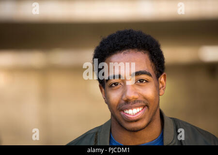 African American teenage boy smiling Stock Photo: 217862383 - Alamy