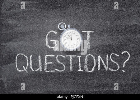 got questions phrase written on chalkboard with vintage stopwatch used instead of O Stock Photo