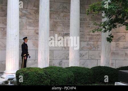 Brigadier Gen. Tony L. Wright, deputy commanding general, 88th Readiness Division, reads the inscription of the Warren G. Harding Tomb in Marion, Ohio, July 21 prior to a wreath laying ceremony honoring the 29th president of the United States. Wright served as President Donald J. Trump's representative for the annual ceremony. Stock Photo