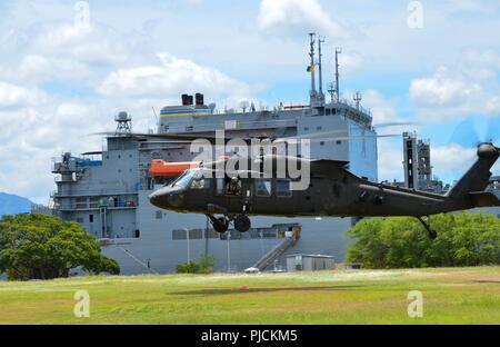 JOINT BASE PEARL HARBOR-HICKAM, Hawaii (July 12, 2018) – A U.S. Army UH-60 Black  Hawk helicopter, assigned to Bravo Company, 2-25 Aviation Regiment, 25th  Combat Aviation Brigade prepares to lift off from