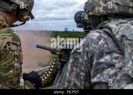 U.S. Army Reserve Troop List Unit Soldiers qualify with an M2 machine gun during Operation Cold Steel II, at Joint Base McGuire-Dix-Lakehurst, N.J., July 21, 2018. Operation Cold Steel is the U.S. Army Reserve’s crew-served weapons qualification and validation exercise to ensure that America’s Army Reserve units and Soldiers are trained and ready to deploy on short-notice and bring combat-ready and lethal firepower in support of the Army and our joint partners anywhere in the world. Stock Photo