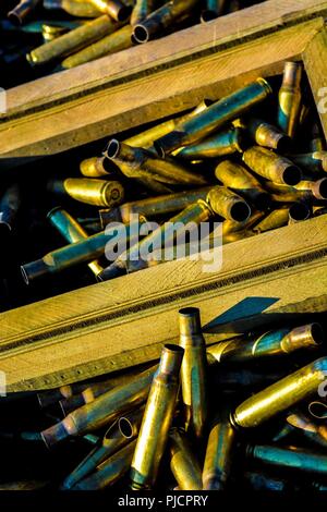 Spent casings are sorted and weighed for turn in during Operation Cold ...