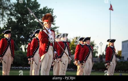 Soldiers with Fife and Drum Corps, 3d U.S. Infantry Regiment (The Old Guard), perform at the Fortissimo Tattoo 2018, in Ottawa, Canada, July 20, 2018. Fortissimo is a three night military spectacular which has drawn thousands of spectators since it began in 1997. The event also featured performances from Canadian’s Massed Pipes and Drums and the Ceremonial Guard. Stock Photo