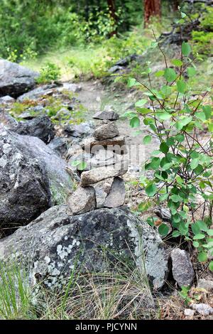Tree Bark Inukshuk An iconic Inuit symbol, the Inukshuk Stock Photo - Alamy