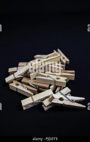 Pile of Wooden Clothespin Clips Stock Photo