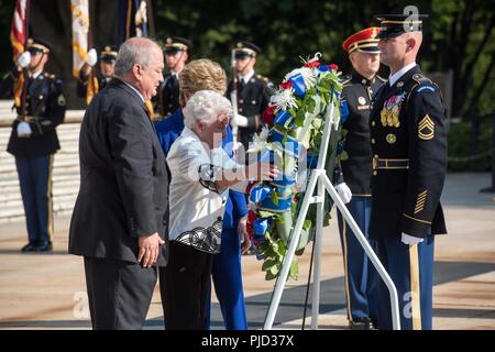 Irene Perez Ploke Sgambelluri, participates in an Army Full Honors Wreath Laying ceremony, at the Tomb of the Unknown Soldier, Arlington National Cemetery, Va., July 16, 2018. The ceremony, featuring Soldiers from the 3d U.S. Infantry Regiment (The Old Guard) and The United States Army Band 'Pershing's Own', commemorated the 74th Anniversary of the Liberation of Guam, the Battle for the Northern Mariana Islands, and the War in the Pacific. Stock Photo
