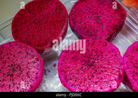 Sliced and peeled fresh pitaya fruit. Dragon fruit