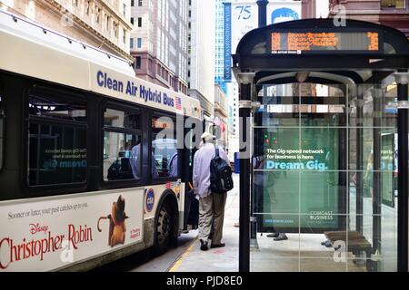 Chicago Illinois USA. A CTA bus halted at a bus stop to take on passengers on LaSalle Street in the heart of the city s financial district Stock Photo Alamy