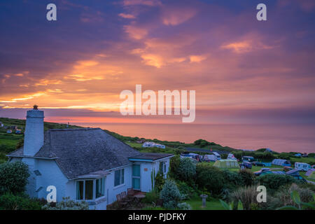 St. Ives, England -  May 2018 : Beautiful colorful sunset over the campground on the Cornish coast, Cornwall,  UK Stock Photo