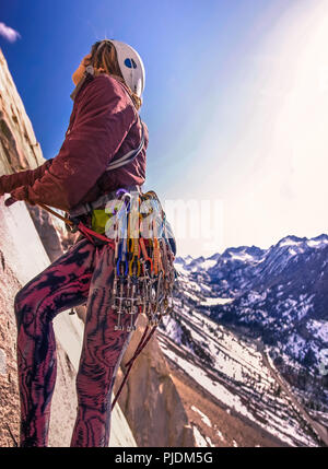 Woman rock climbing, Cardinal Pinnacle, Bishop, California, USA
