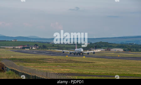 Cargolux Boeing 747-800F departing Prestwick Inernational Airport bound for Luxembourg laden with freight taking off. Stock Photo